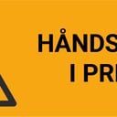 ISO7010_Handskader-i-presse-02.jpg